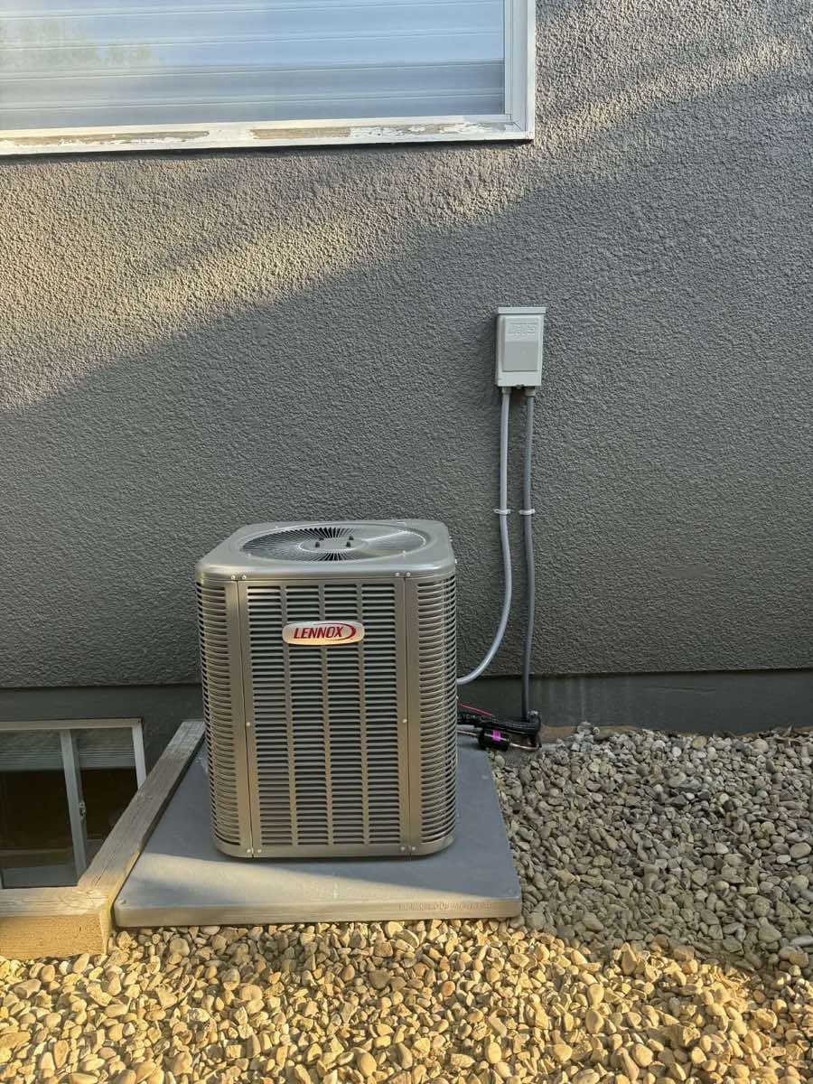 Lennox central air conditioning unit professionally installed outside a Calgary home