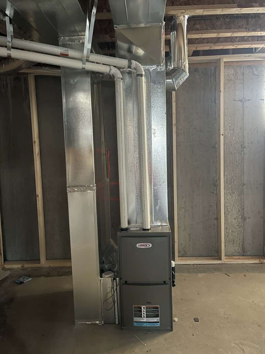 Lennox high-efficiency furnace installed in a new construction home with custom ductwork